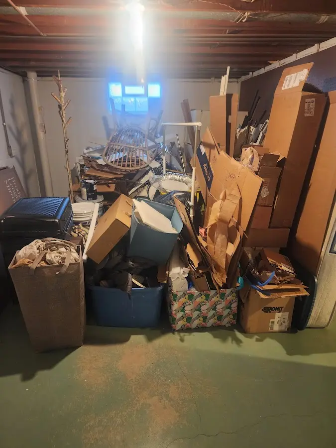 Roll-off dumpster container at job site for 8 Yard Dumpster Rental in Berea